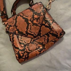 100% real snake skin him back over the shoulder